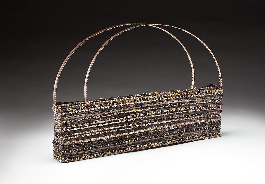 Shell Bag (2011), steel, lace, pearls, shells, bullet casings, 18 by 27.5 by 3 inches